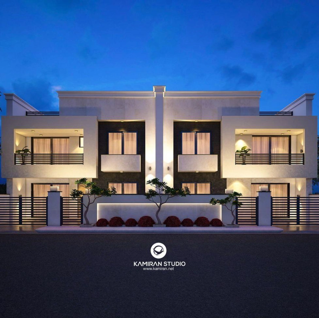 Empreendimento residencial moderno iluminado à noite